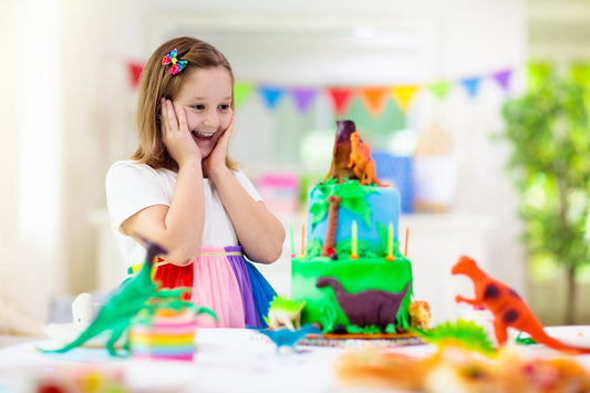The Ultimate Dinosaur Party Activity: Dino-Mite Discovery Goody Bag Bar + Snow Globe Craft